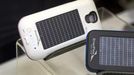 Smartphone cases with solar photovoltaic cells by EnerPlex are displayed during &quot;CES Unveiled,&quot; a media preview event to the annual Consumer Electronics Show (C