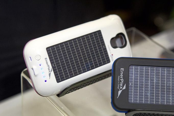 Smartphone cases with solar photovoltaic cells by EnerPlex are displayed during &quot;CES Unveiled,&quot; a media preview event to the annual Consumer Electronics Show (C