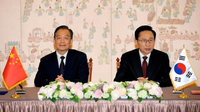 Jihokorejský prezident (vpravo) je zapáleným presbyteriánem.