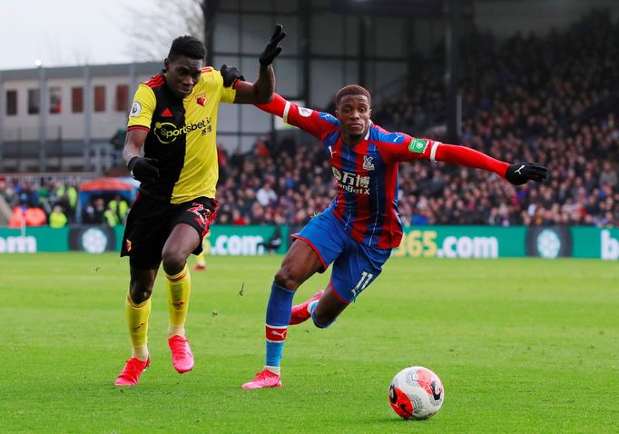 Soccer Football - Premier League - Crystal Palace v Watford - Selhurst Park, London, Britain - March 7, 2020  Watford's Ismaila Sarr in action with Crystal Palace's Wilfr