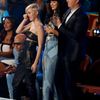 Miley Cyrus reacts as a spokesperson named Jesse accepts the award for video of the year for her song &quot;Wrecking Ball&quot; as Katy Perry and Sam Smith applaud
