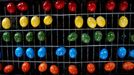 Colored eggs lay on a conveyor on March 30, 2012 at the egg dye factory in Thannhausen, southern Germany. During the Easter season, the plant produces daily around 180,000 hard-boiled and dyed eggs.