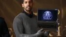 Magician David Blaine shows a computer image before a demonstration of his upcoming performance "Electrified" during a press briefing in New York, October 2, 2012. During the performance Blaine will wear a custom made metalic suit and will stand on a 20-foot-high (6 meter) platform on New York City's Pier 54 on the edge of the Hudson River while surrounded by seven metallic orbs, or tesla coils, that will stream 1 million volts of electricity around him for 3 days and nights. REUTERS/Mike Segar (UNITED STATES - Tags: SOCIETY ENTERTAINMENT) Published: Říj. 2, 2012, 7:09 odp.