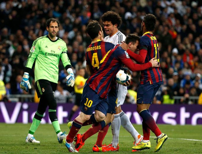 Barcelona's Messi and Neymar celebrate a goal as Real Madrid's Pepe holds the neck of Fabregas and goalkeeper Lopez looks on during La Liga's second 'Clasico' soccer matc