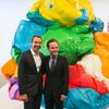 Artist Jeff Koons poses with Scott Rothkopf, the associate director of programs at the Whitney, during a press preview in New York