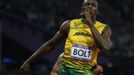 RNPS IMAGES OF THE YEAR 2012 - Jamaica's Usain Bolt celebrates winning the men's 200m final during the London 2012 Olympic Games at the Olympic Stadium August 9, 2012. REUTERS/Lucy Nicholson (BRITAIN - Tags: OLYMPICS SPORT ATHLETICS TPX IMAGES OF THE DAY) Published: Pro. 3, 2012, 1:03 dop.