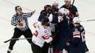 Players of the U.S. and Switzerland fight during the first period of their men's ice hockey World Championship group B game at Minsk Arena in Minsk May 10, 2014. REUTERS/