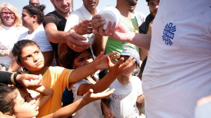 Charita pomáhá uprchlíkům (ilustrační foto).