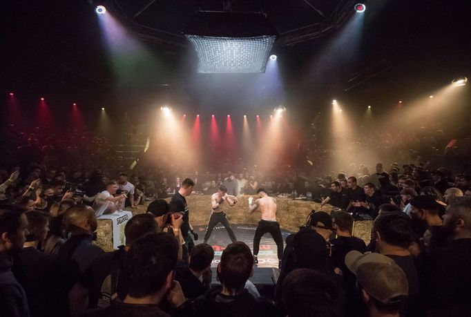 Spectators watch the "Top Dog" bare-knuckle boxing tournament in Moscow, Russia April 16, 2021. Picture taken April 16, 2021. REUTERS/Shamil Zhumatov