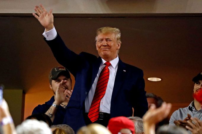 Oct 27, 2019; Washington, DC, USA; President Donald Trump waves to the crowd during game five of the 2019 World Series between the Houston Astros and the Washington Natio