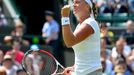 Petra Kvitová v zápase proti Jekatěrině Makarovové na Wimbledonu 2013