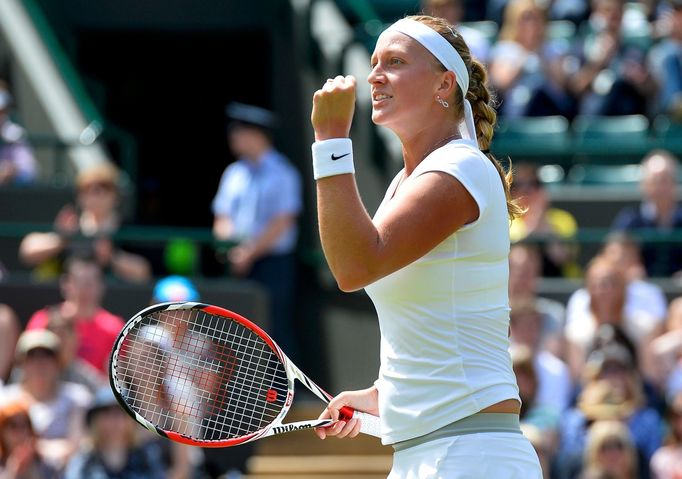 Petra Kvitová v zápase proti Jekatěrině Makarovové na Wimbledonu 2013