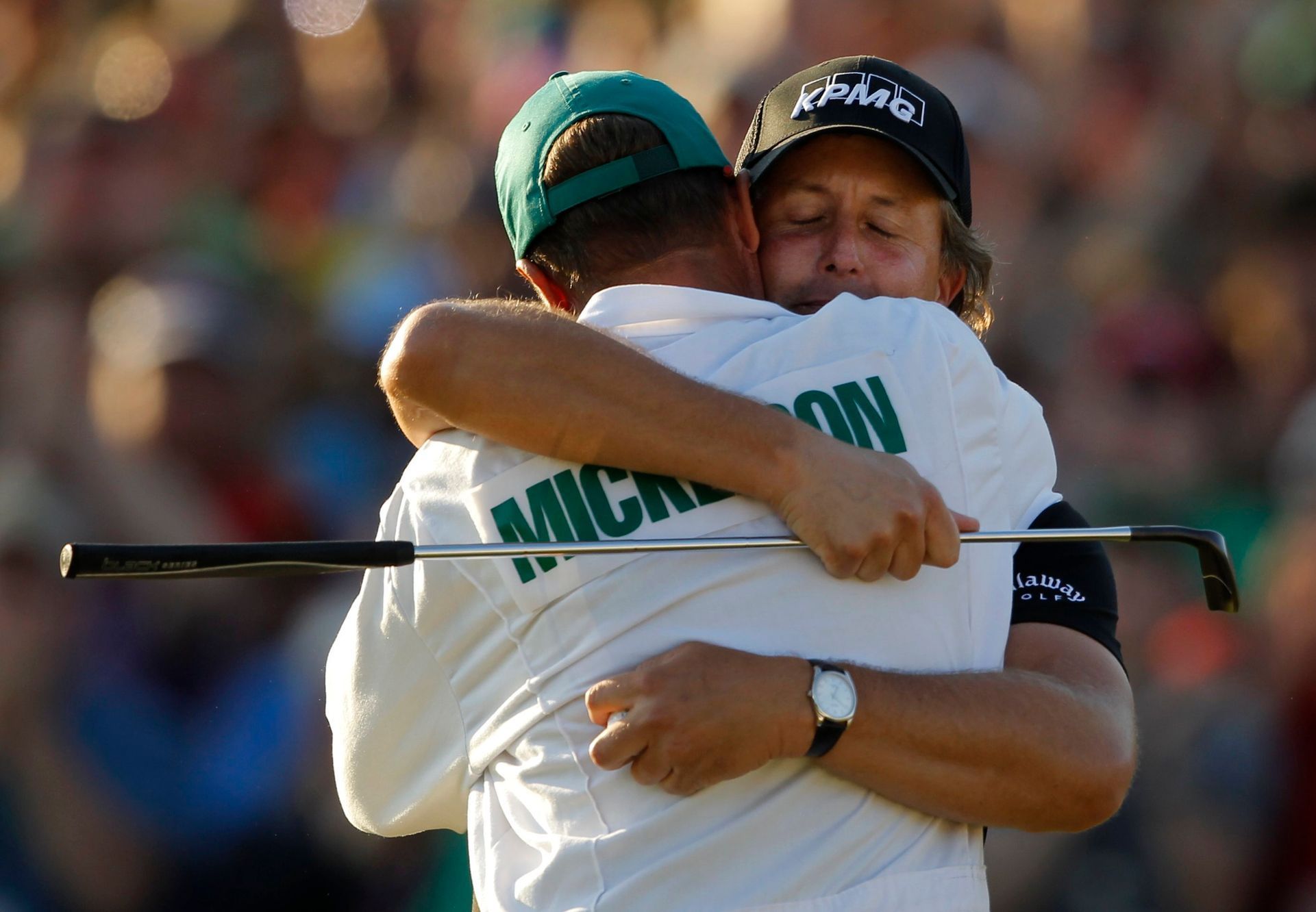 Phil Mickelson se svým caddym