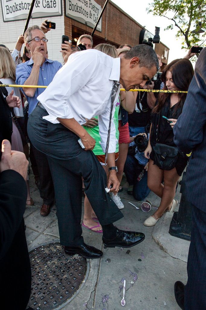 April 24, 2012 "The President wipes off his trousers after being splattered by frozen yogurt while shaking hands along a ropeline in Boulder, Colo. University of Colorado student Kolbi Zerbest had placed her cup of yogurt on the ground while trying to shake hands with the President, and someone else inadvertently kicked the cup."