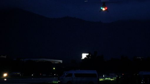 A military helicopter believed to be carrying rescued schoolboys takes off near Tham Luang cave complex in the northern province of Chiang Rai, Thailand