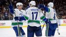 Mar 21, 2015; Los Angeles, CA, USA; Vancouver Canucks right wing Radim Vrbata (17) celebrates with left wing Yannick Weber (right) and left wing Daniel Sedin (left) again