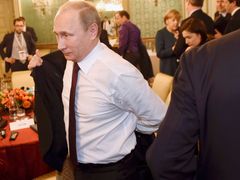 Vladimir Putin na summitu v Miláně.