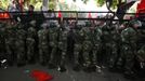 Riot police block demonstrators during a protest outside the Japanese embassy in Beijing September 15, 2012. Hundreds of people protested in front of the Japanese embassy in Beijing on Saturday, throwing objects at the building as police struggled to keep control, amid growing tensions between Asia's two biggest economies over a group of disputed islands. REUTERS/David Gray (CHINA - Tags: CIVIL UNREST POLITICS)