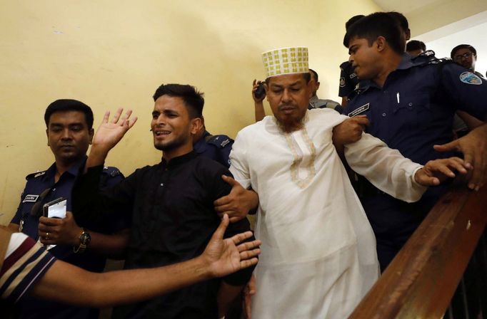 Accused people are taken out of the court premises after they were given death sentences in a murder case in Feni, Bangladesh, October 24, 2019. REUTERS/Stringer