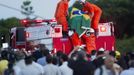 The coffin of architect Oscar Niemeyer leaves the Planalto Palace on a fire engine in Brasilia December 6, 2012. Niemeyer, a towering patriarch of modern architecture who shaped the look of modern Brazil and whose inventive, curved designs left their mark on cities worldwide, died late on Wednesday. He was 104. Niemeyer had been battling kidney and stomach ailments in a Rio de Janeiro hospital since early November. His death was the result of a lung infection developed this week, the hospital said, little more than a week before he would have turned 105. REUTERS/Ueslei Marcelino (BRAZIL - Tags: OBITUARY SOCIETY TPX IMAGES OF THE DAY) Published: Pro. 6, 2012, 10:06 odp.