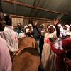 Members of the Musanda Holy Ghost Church in Kibera pray during New Year's celebrations in Nairobi