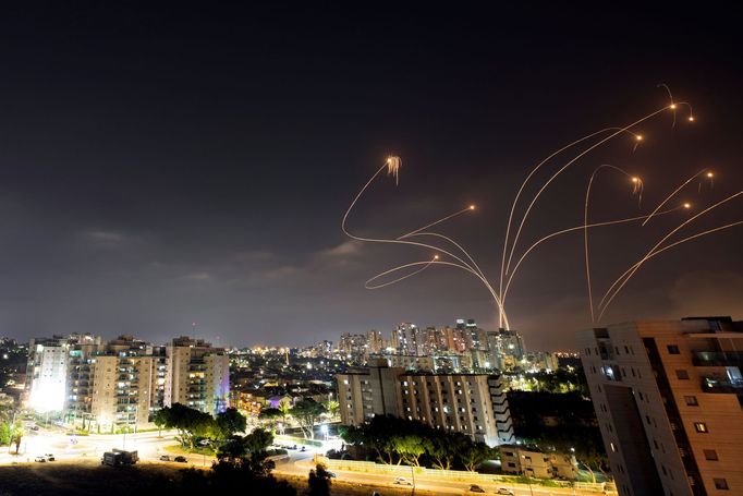 Streaks of light are seen as Israel's Iron Dome anti-missile system intercepts rockets launched from the Gaza Strip towards Israel, as seen from Ashkelon, Israel May 10,