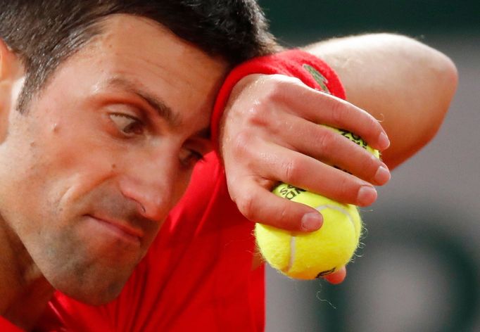 Tennis - French Open - Roland Garros, Paris, France - October 11, 2020 Serbia’s Novak Djokovic reacts during the final against Spain’s Rafael Nadal REUTERS/Charles Platia