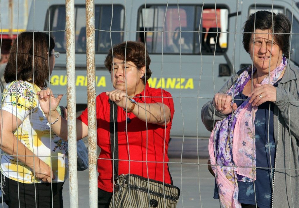 Turisté versus migranti na Lampeduse