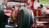 Kimi Räikkönen ve Ferrari se raduje z vítězství ve Velké ceně Belgie formule 1.