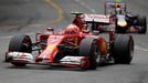 Ferrari Formula One driver Kimi Raikkonen of Finland leads Red Bull Daniel Ricciardo of Australia during the Monaco Grand Prix in Monaco May 25, 2014. REUTERS/Max Rossi (