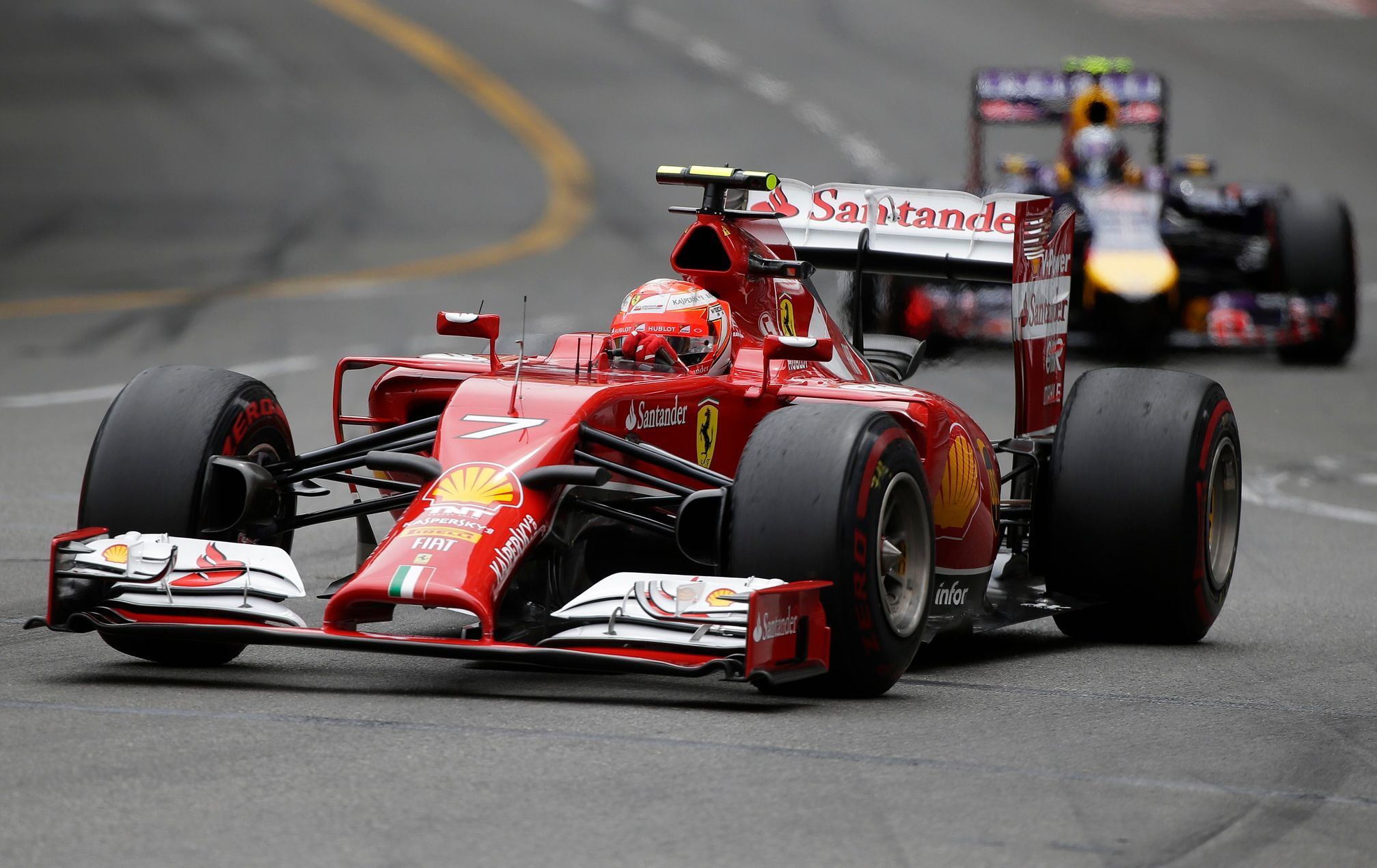 Ferrari Formula One driver Raikkonen of Finland leads Red Bull Ricciardo of Australia during the Monaco Grand Prix in Monaco