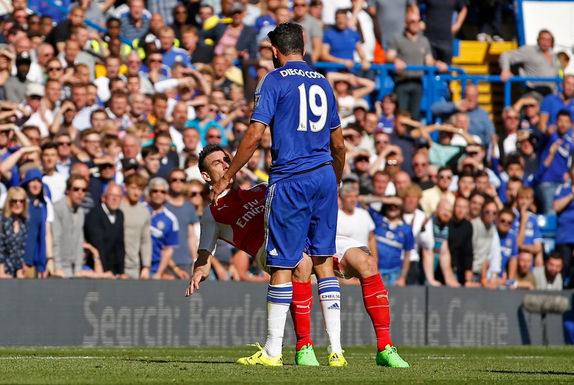 Chelsea's Diego Costa clashes with Arsenal's Laurent Koscielny