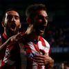 Atletico Madrid's Lopez celebrates with team mate Turan after scoring the first goal for the team during their Champions League semi-final second leg soccer match against Chelsea at Stamford Bridge St