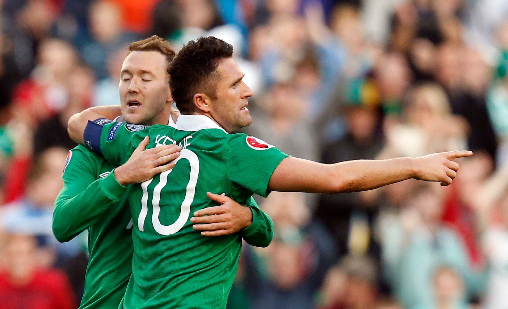 Ireland's Keane is congratulated by McGeady after scoring against Gibraltar during their Euro 2016 qualifying match in Dublin