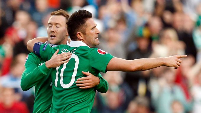 Ireland's Keane is congratulated by McGeady after scoring against Gibraltar during their Euro 2016 qualifying match in Dublin