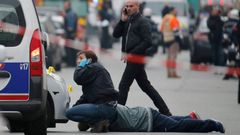 Policejní fotograf na místě střelby v pařížském sídle Charlie Hebdo