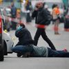 Policejní fotograf na místě střelby v pařížském sídle Charlie Hebdo