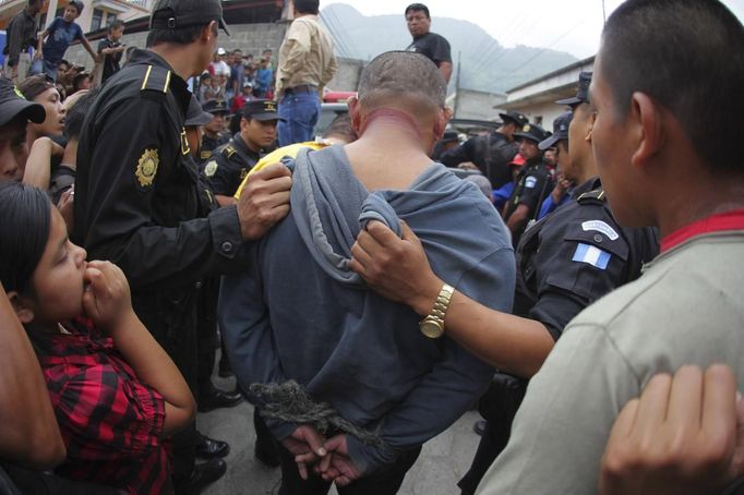 Správa systému Django Vítejte, uživateli admin_danielp@centrum.cz. Domů Article Photo Video Category Domů › Photo › Photos › Police officers arrest and rescue four men who were tied up and beaten by local villagers that accused ... Photo: změnit Historie Photo Title: Police officers arrest and rescue four men who were tied up and beaten by local villagers that accused them of theft at Tactic Image: link: http://content.reuters.com/auth-server/content/tag:reuters.com,0000:newsml_GM1E89E069V01:1935764442/tag:reuters.com,0000:binary_GM1E89E069V01-BASEIMAGE?token=4GjzlV9EZHSs2mCetqXgv4xffF+tM59ryfbfQ+HdRaQ= Vložit fotku do adminu >> Keywords: GUATEMALA/ Description: Police officers arrest and rescue four men who were tied up and beaten by local villagers that accused them of theft at Tactic, in the Alta Verapaz region, about 189 km (117 miles) from Guatemala City, September 13, 2012. The local community tied up and beat four men who were accused of theft in the aftermath of a school killing, which had occurred on Wednesday. The man, who had entered a classroom and killed two children, ages 8 and 13, with a machete, was lynched and burnt alive by a mob, local media reported. REUTERS/Jorge Dan Lopez (GUATEMALA - Tags: CRIME LAW SOCIETY) Published: Zář. 13, 2012, 6:17 odp. Odstranit