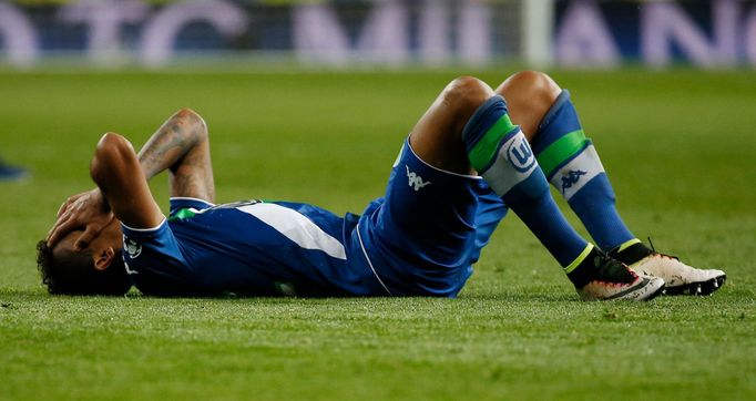 Wolfsburg's Luiz Gustavo looks dejected at the end of the game