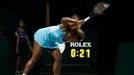 Serena Williams of the U.S. smashes her second racquet during her WTA Finals singles semi-finals tennis match against Caroline Wozniacki of Denmark at the Singapore Indoo