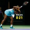 Serena Williams of the U.S. smashes her second racquet during her WTA Finals singles semi-finals tennis match against Caroline Wozniacki of Denmark at the Singapore Indoor Stadium