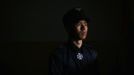 Chimedbaatar, a member of the Mongolian neo-Nazi group Tsagaan Khass, poses for a portrait at the group's headquarters in Ulan Bator June 23, 2013. The group has rebranded itself as an environmentalist organisation fighting pollution by foreign-owned mines, seeking legitimacy as it sends Swastika-wearing members to check mining permits. Over the past years, ultra-nationalist groups have expanded in the country and among those garnering attention is Tsagaan Khass, which has recently shifted its focus from activities such as attacks on women it accuses of consorting with foreign men to environmental issues, with the stated goal of protecting Mongolia from foreign mining interests. This ultra-nationalist group was founded in the 1990s and currently has 100-plus members. Picture taken June 23, 2013. REUTERS/Carlos Barria (MONGOLIA - Tags: SOCIETY POLITICS BUSINESS EMPLOYMENT ENVIRONMENT) ATTENTION EDITORS: PICTURE 02 OF 25 FOR PACKAGE 'MONGOLIA'S ENVIRONMENTAL NEO-NAZIS'. TO FIND ALL IMAGES SEARCH 'TSAGAAN KHASS' Published: Čec. 2, 2013, 9:57 dop.