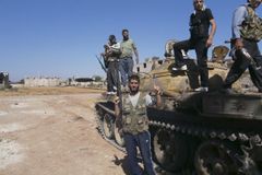 Boje pokračují, povstalci zlikvidovali Asadova generála
