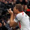 Liverpool's Gerrard celebrates scoring his second penalty against Manchester United during their English Premier League match in Manchester