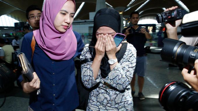 Příbuzní a blízcí cestujících z letu MH17.
