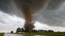 STORM CHASER Stormchaser Mike Hollingshead drives thousands of miles to photograph extreme weather conditions. Come hell or high water, Hollingshead pays no heed to storm warnings, clocking up around 20,000 miles to capture shots of some 40 storms a year. Born in Nebraska in 1976, Mike went on his first storm chase east of town in 1999 - witnessing his first tornado. He never looked back.... Quitting his job in March 2004 at a local big corn milling plant, Mike started capturing the natural phenomena in pictures. Now, this foul-weather friend can safely say he has peered into the eye of the storm: tornadoes, twisters, typhoons, halos, light pillars, geomagnetic storm auroras, twilights supercells - he has seen them all. Mike says: "I'm often asked what was my favourite storm. After a lot of years and some truly crazy storms. It's just not possible to have an answer - so many different ones have blown my mind in different ways. "That is what I chase for. All the other levels of storms below the truly crazy ones, I just don't care a lot for anymore." And, by way of respite. As the calm after the storm arrives, Mike likes to chill....by going extreme birdwatching. Specifically snow-geese. Millions of them! "I see extreme numbers of snow-geese on their migrations south in the fall or north in the spring. The trick is being there those days they max out. It's an indescribable sight to see one million plus snow-geese." Tornado from a tornadic supercell approaches from the south, west of York Nebraska June 20, 2011. USA - July 2011 MANDATORY: IMAGE