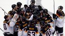 Germany's players celebrate after their men's ice hockey World Championship Group B game against Kazakhstan at Minsk Arena in Minsk May 10, 2014. Reuters/Alexander Demian