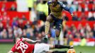 Manchester United's Morgan Schneiderlin and Arsenal's Danny Welbeck