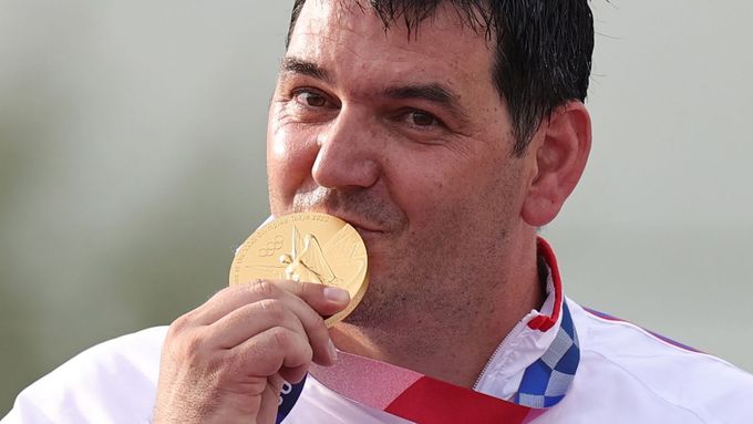 Jiří Lipták se zlatou olympijskou medailí.