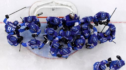 Italy's players celebrate at the end of their men's ice hockey World Championship group A game against France at Chizhovka Arena in Minsk May 11, 2014. REUTERS/Vasily Fed